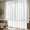 soft white linen texture sheer curtain with natural weave drapes in a bright modern home interior